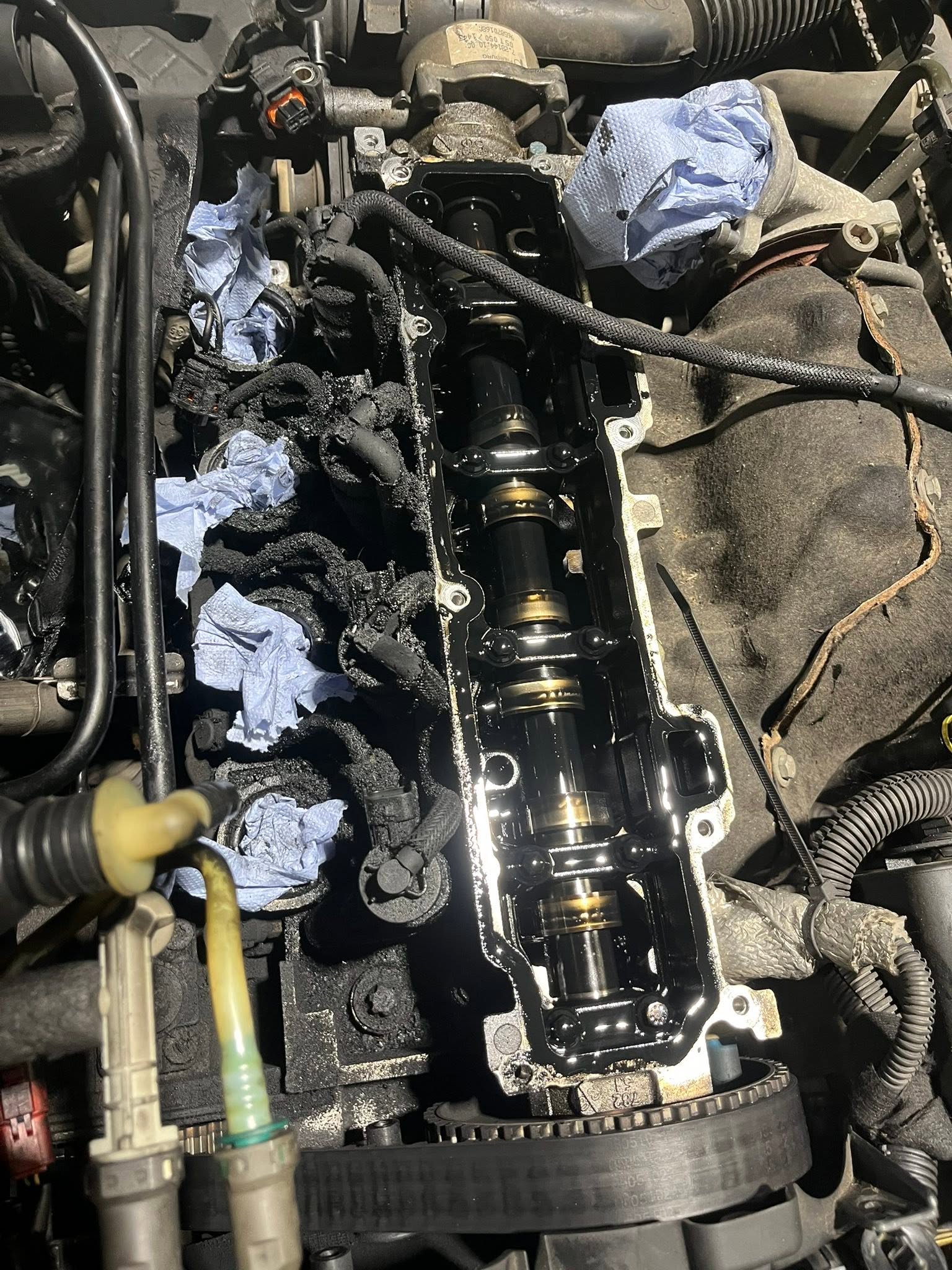 Cylinder head with the rocker cover removed exposing the camshaft